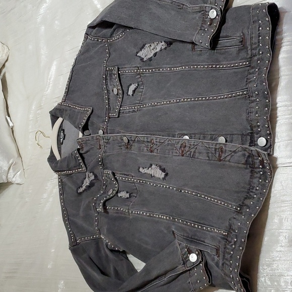 Distressed black jean jacket with studs. - Picture 2 of 4